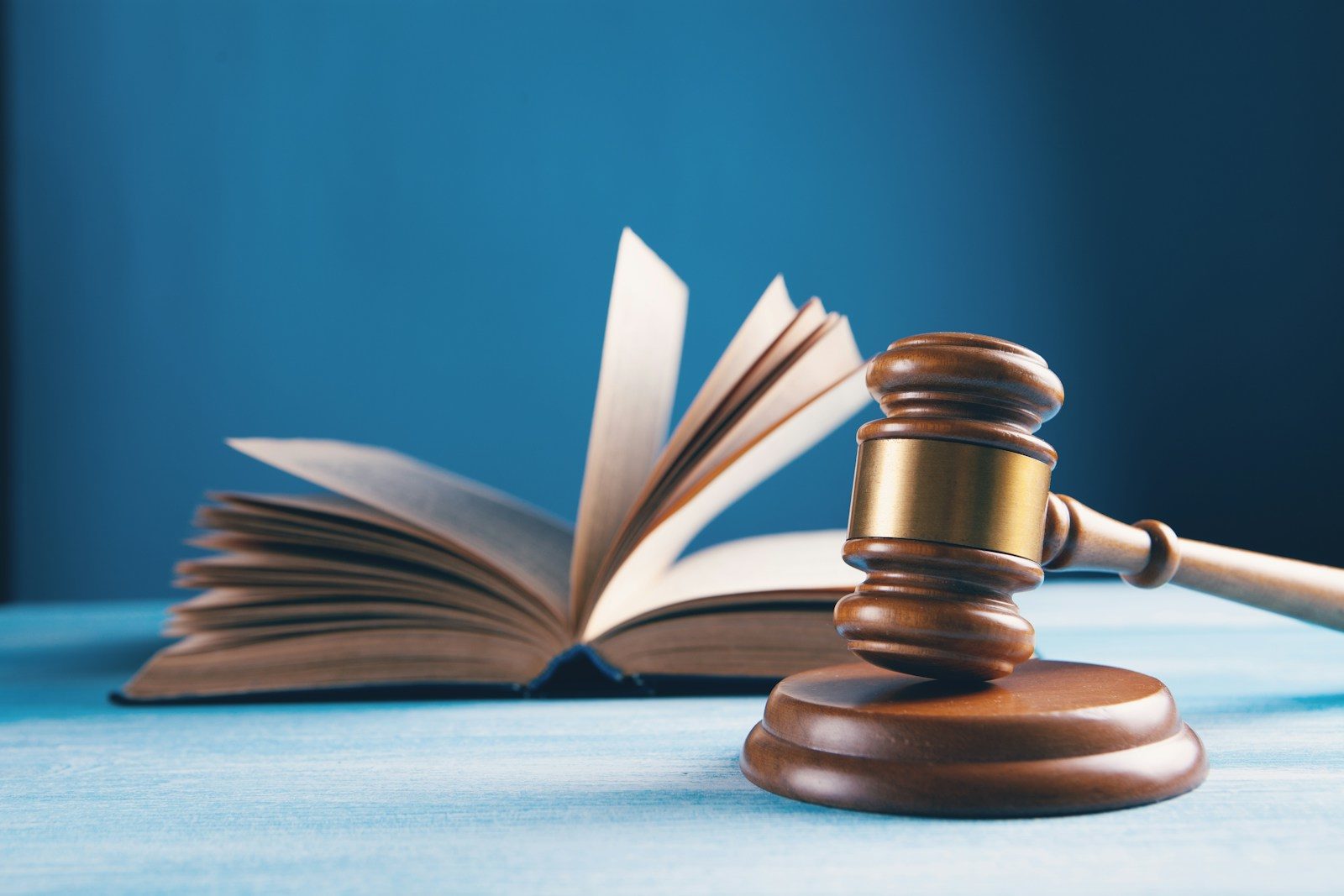 Photo by Sasun Bughdaryan judges gavel and open book on table